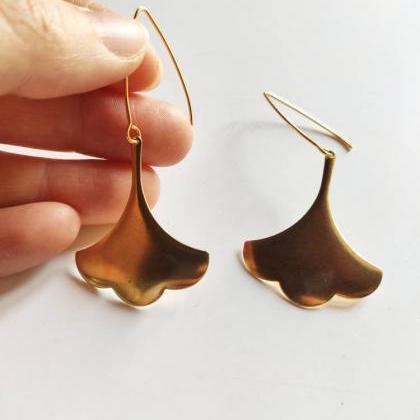 Golden Brass Dangling Earrings In The Shape Of An..