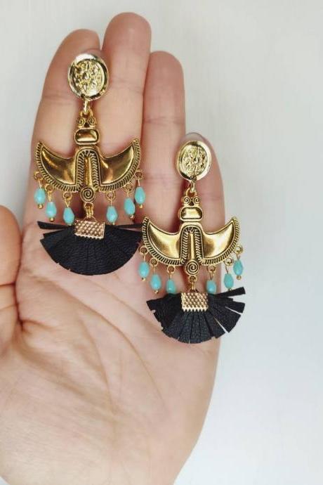 Large oriental-style gold brass pendant earrings with black fan leather tassel and crystalline blue