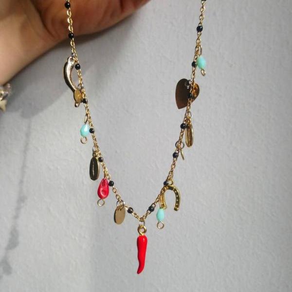 Steel choker necklace and black beads with pendants and red chilli